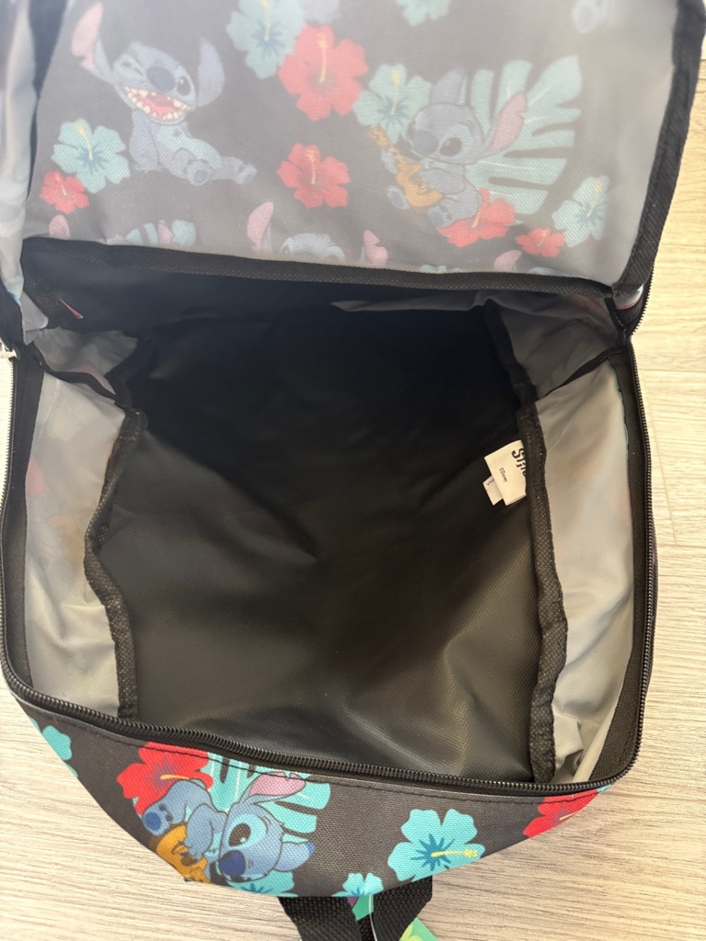 Disney Black Backpack with Blue Stitch and Red Floral Accents - Picture 6 of 7